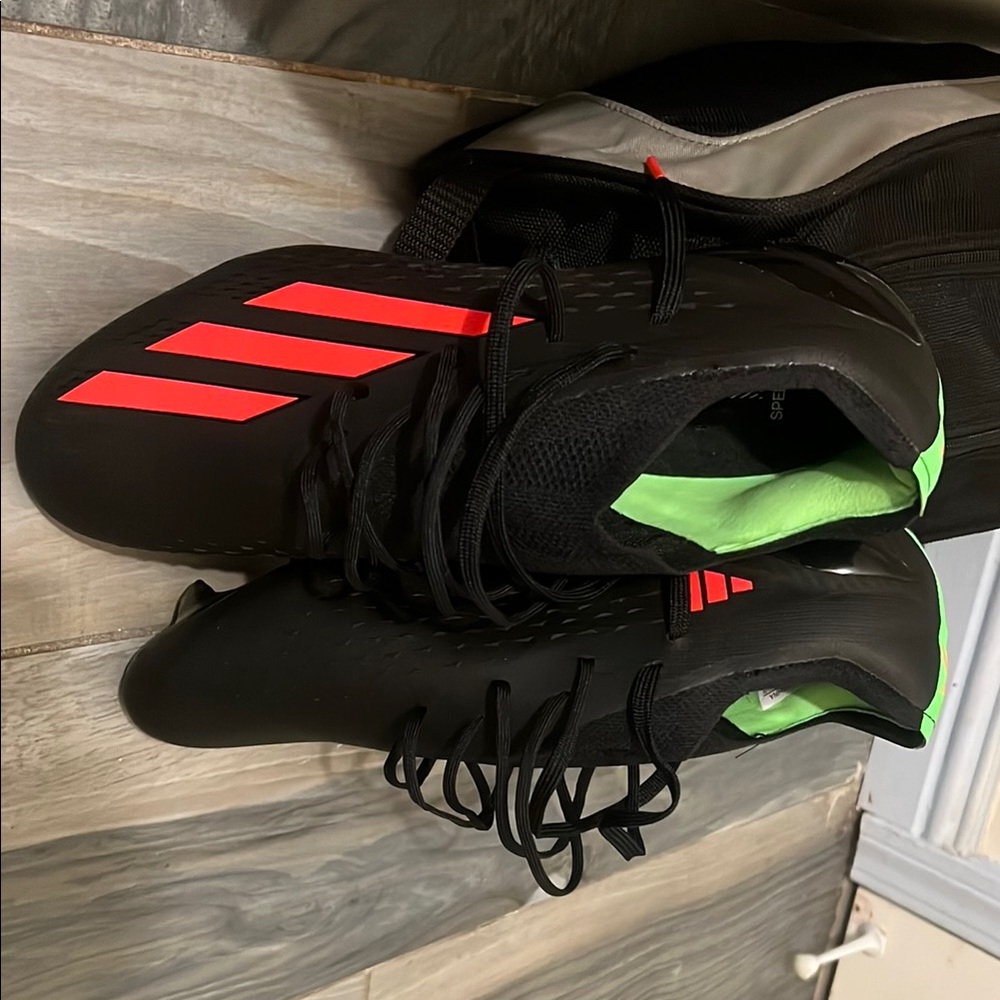 Adidas Black and Red Athletic Shoes with Modern Design
